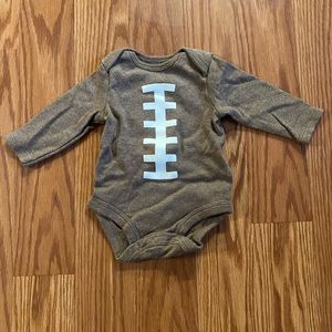Carter’s football onesie